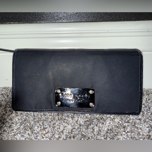 kate spade Handbags - Kate spade black nylon trifold snap wallet